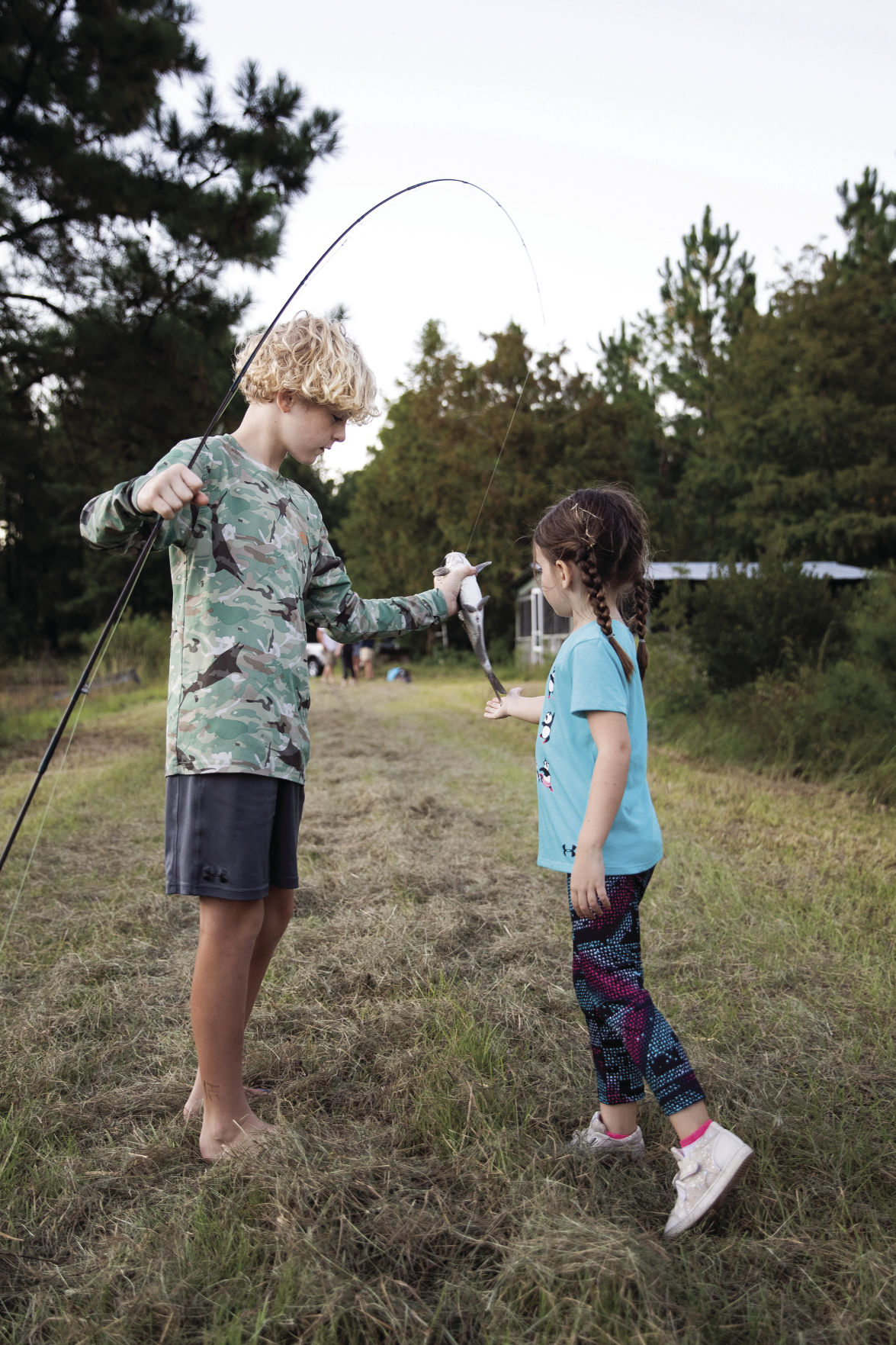 Boy Showing Fish to Girl_CMYK.jpg